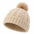 Bonnet taille unique en maille beige à pompon torsadé